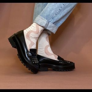 Schutz loafers with silver embellished tassels